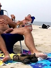 Nude men Sunbathe on the beach