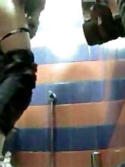 Unlucky girls get filmed peeing in toilet