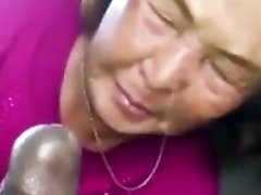 Chinese Granny Sucks Black Cock In The Camper