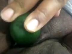 This mature Bbw is not startled to fuck her pussy with a cucumber on camera