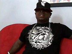 Shaven black man drills ebony hottie with cat paws tattoo on her jugs