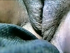 Chubby African preggo woman masturbating on webcam