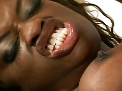 Hot ebony with natural bumpers rides black cock reverse cowgirl