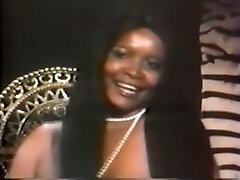 Delicious and pretty vintage black girl with enormous knockers