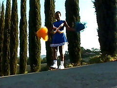 After fucking a black stud, a plump cheerleader gets it on with a white one