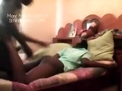 African teacher pummeling student for grades