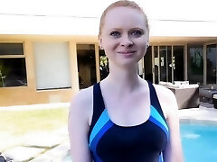 Teenager ginger ass on black dark by the pool