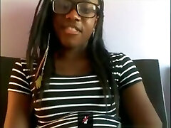 Black dweeb with glasses masturbates with a hairbrush on her couch on skype
