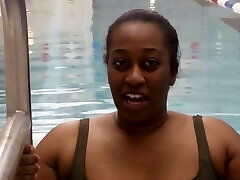 Bbw Black woman put a pink latex swimcap
