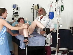 Four sexy ladies getting pleased in the doctors bedroom