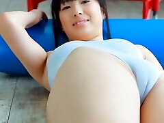 Charming Asian babe with pretty grin Oshima Tamana looks very warm