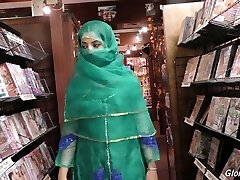 Red-hot Pakistani chick Nadia Ali sucks big dick in the glory hole room