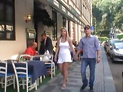 German couple playing with each other in public