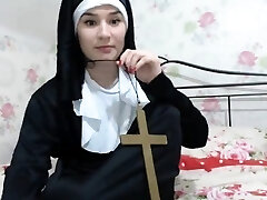 Sexy chick is dressed as a nun and taunts to showcase a little 