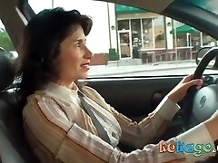 Insane brunette woman in the car
