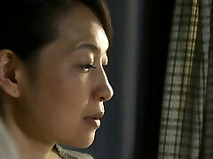 Stunning older japanese nurse gets her large titties felt up