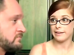 Red haired lady with glasses