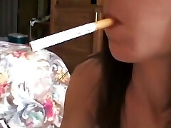 धूम्रपान करते हुए हस्तमैथुन