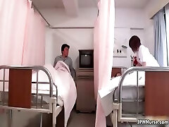 Beautiful Japanese nurse gives a patient some part3