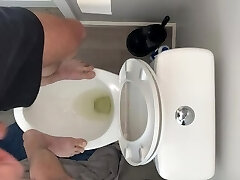 High on pot and fit to bust standing on public toilet desperate to pee open wide gulp up piss slut