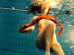 Sexy orange tights of Markova underwater