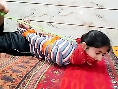 Indian girl hogtied