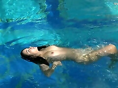 Handsome mermaid Puzan Bruhova performs her hot underwater show