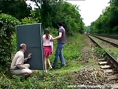 A stud jerks off while watching a couple fucking outdoors