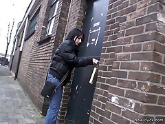 Deep-throating a beefstick through a glory hole after toying with her snatch Deep-throating a beefstick through a glory hole after toying with her snatch