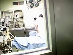Chinese therapist and his nurse fuck in the medical department