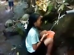 Indonesia lady outdoor nature douche