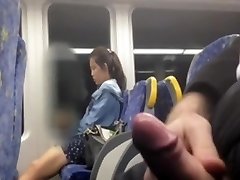 Chinese woman looking at my stiffy at the bus