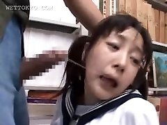 Black-haired asian mouth poked hard in school library