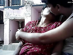 Indian hot building wife kissing and boobs pressing