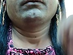 Indian girl pruning her armpits hair by a sharp edged straight razor sleek and clean ..AVI