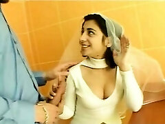 Sexy brunette indian bride talking with a fellow