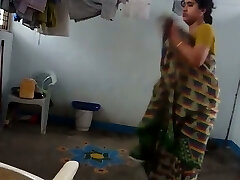 Indian amateur housewife was caught on hidden cam while stripping