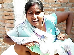 Fantastic Indian bhabhi pissing on her house roof and fingering her cremei tight labia