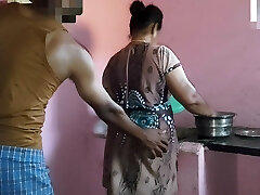 Aunty was working in the kitchen when I had orgy with her