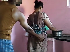 Aunty was working in the kitchen when I had orgy with her