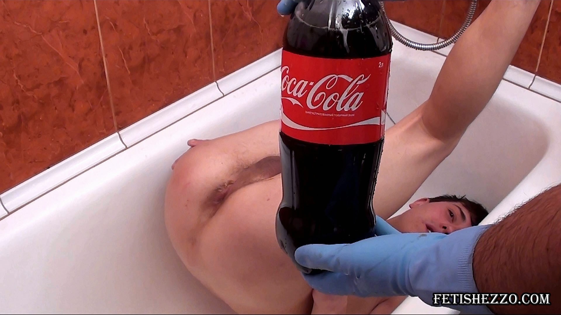 Boy gets a coke enema and gushes out liquid