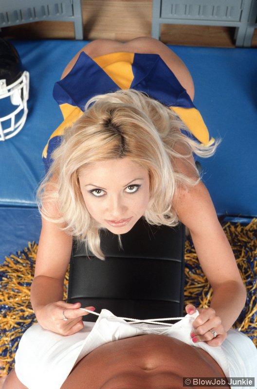 Perky blonde cheerleader stripping and giving blowjob