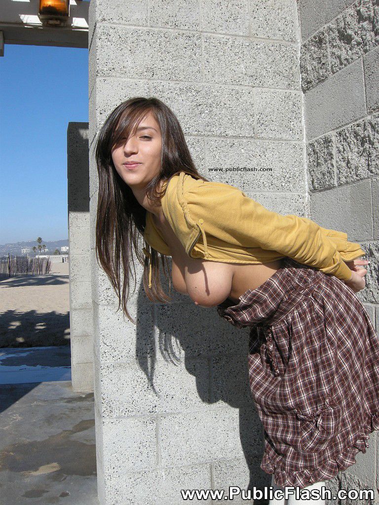 Flashing her perfect boobs all over town