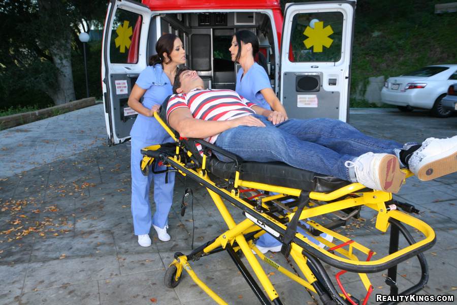Hot Nurse Sucking Huge Cocks - 2 hot big tits nurses suck and fuck a patient in the ambulance check out  these hot 3some fuck pics