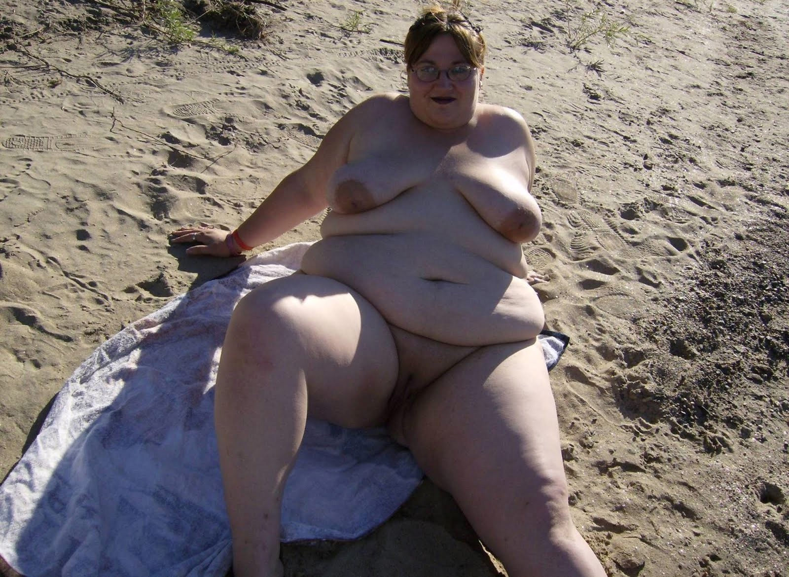 Chubby mature ladies sunbathing on a nudist beach