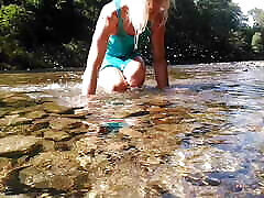 services militaires t-girl swimming in mountain river and wetting teal summer dress ...