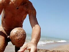 Alexa Cosmic casero ebony naked on the beach getting messy with sand and swimming in the sea...