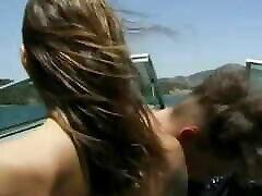 Tan brunette with beautiful breasts gets drilled on a boat