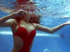 Being naked underwater brings her sexual pleasures