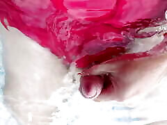 Tranny on sexy red swimsuit cum in pool